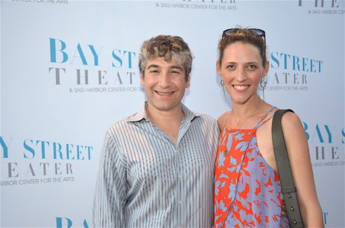 A man and woman posing for a photo at a bay street theater event.