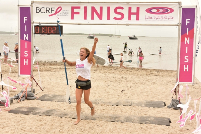 Jill Martin crossing finish line - Photo by: Rob Rich