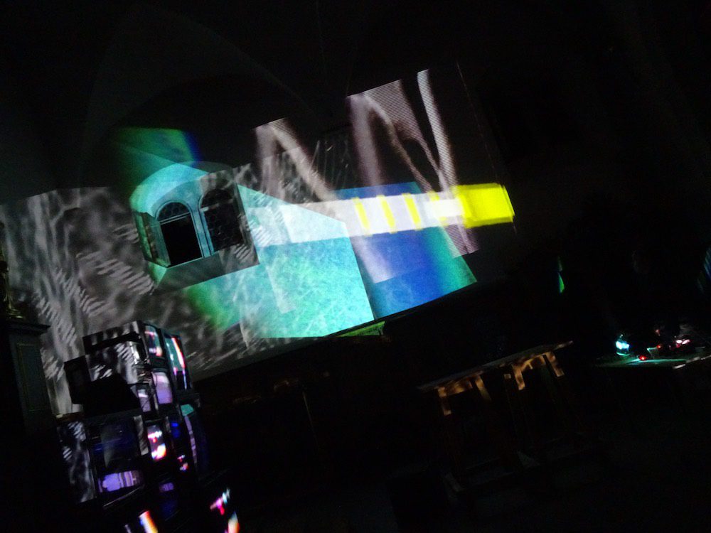 An image of a projection in a dark room.