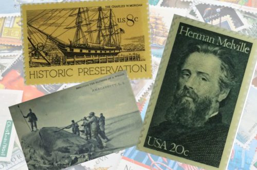 A collection of postage stamps with a picture of a ship and a man.