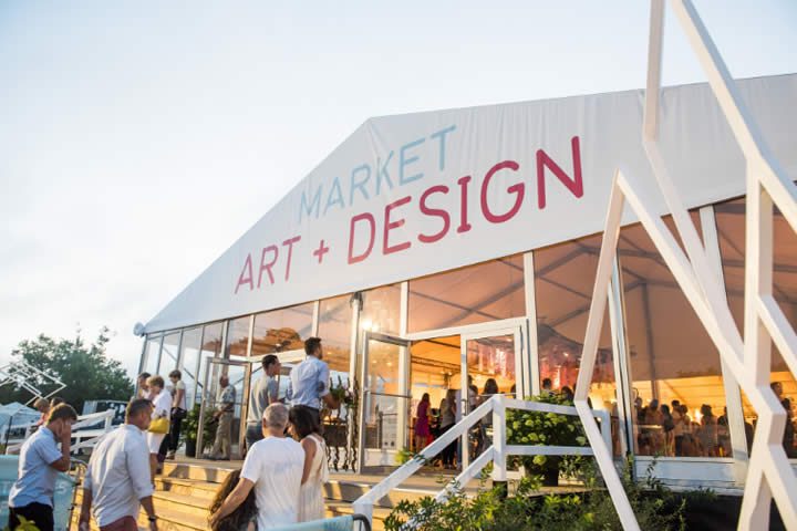 A tent with the word market art and design on it.