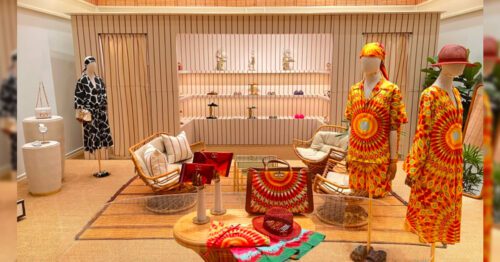 Inside image of a shop with some designer cloths