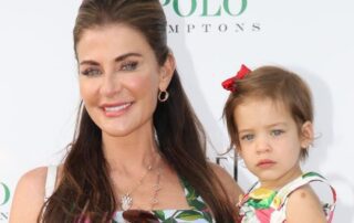 Woman and child at Polo event.