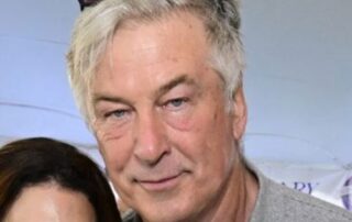 Alec Baldwin with sunglasses on.