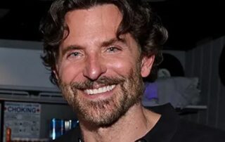 Bradley Cooper smiling headshot portrait.
