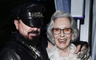 A man and woman smiling for a photo.