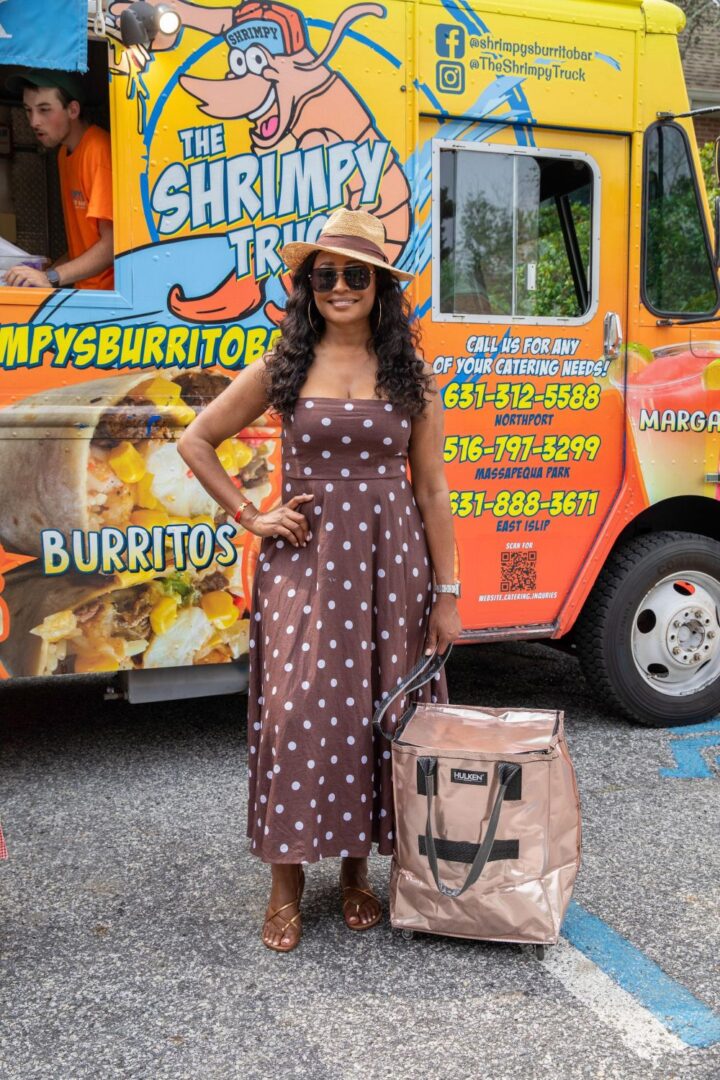 Young man with a slight smile against a gray background.